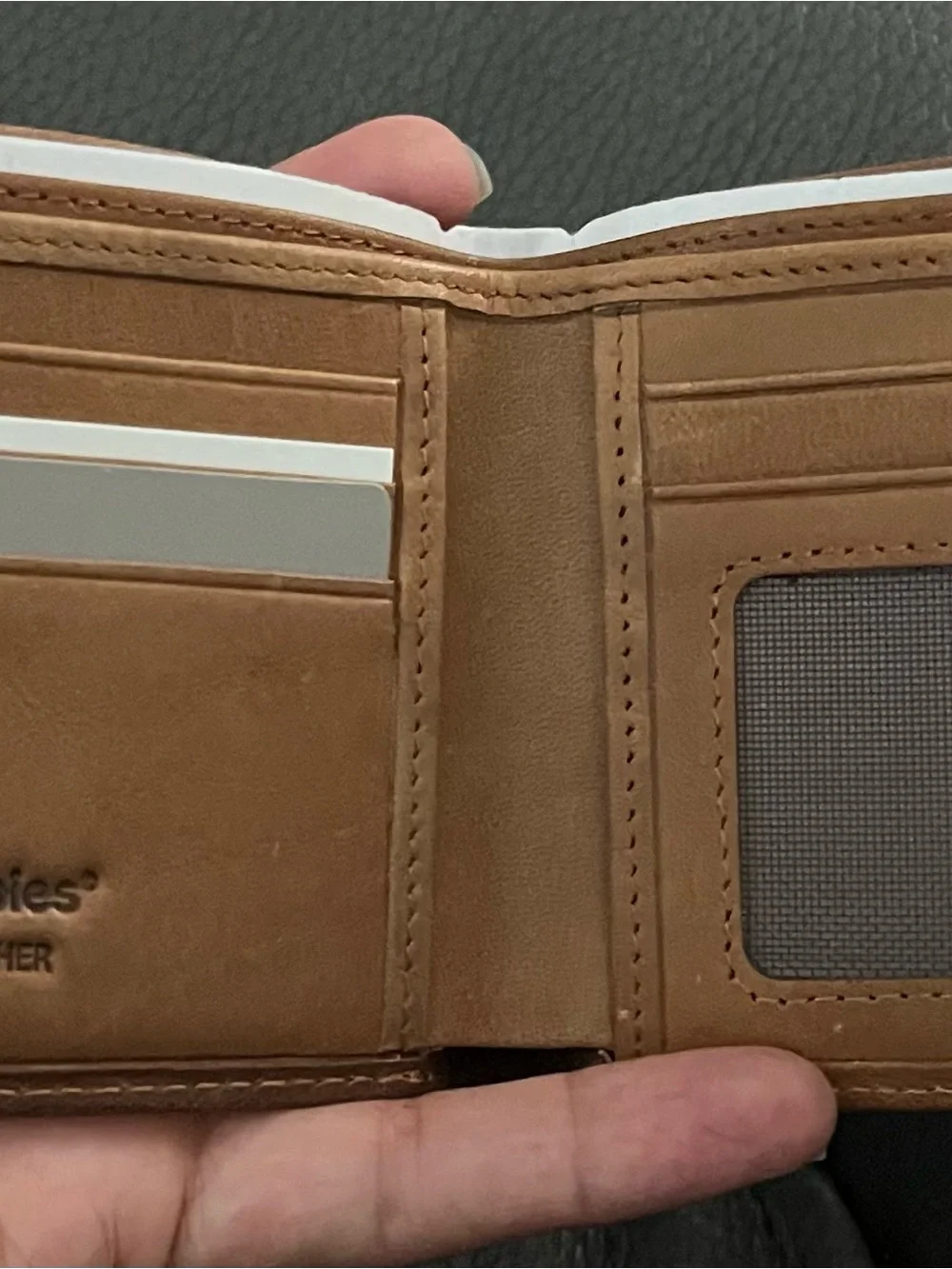 A hot deal- Hush Puppies Tan Leather Bifold Wallet - Embossed Logo